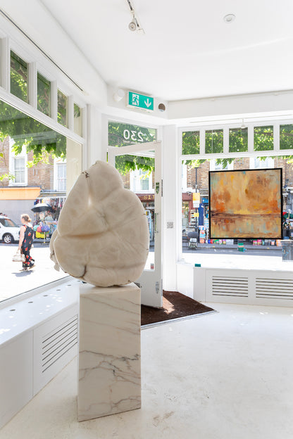 Alabaster Seated Figure, by Paul Vanstone